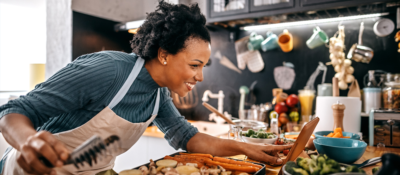 Woman following vegan recipe