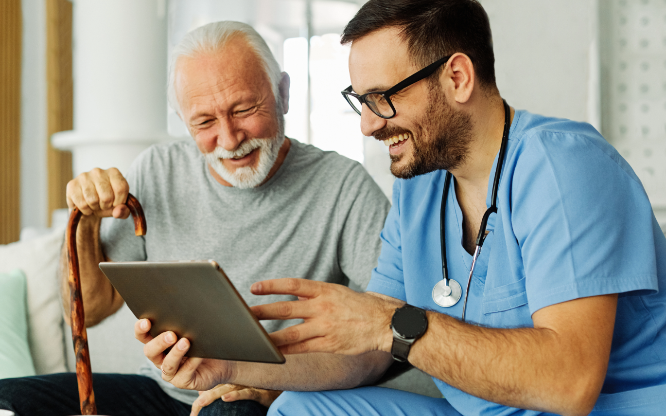 provider and patient reviewing a tablet