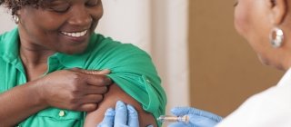 woman receiving a flu shot