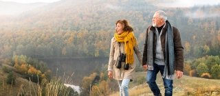 Man and woman walking on a mountian