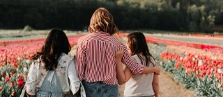 Three women walking outside