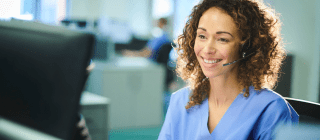 Nurse case manager answering phones in office setting